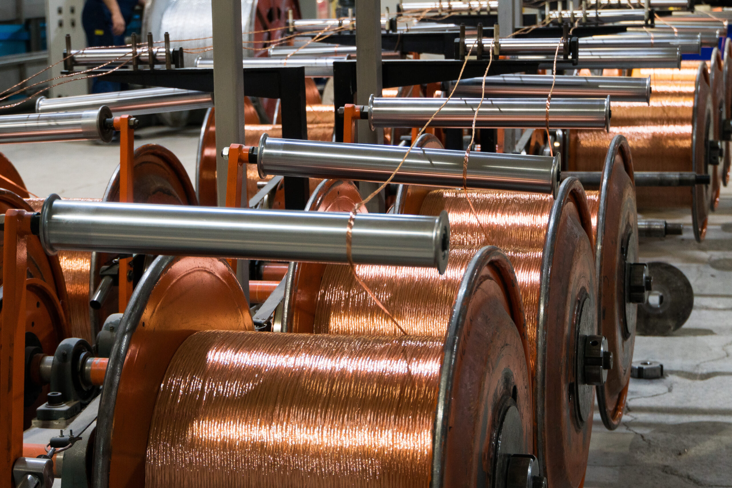 Production of copper wire, bronze cable in reels at factory.